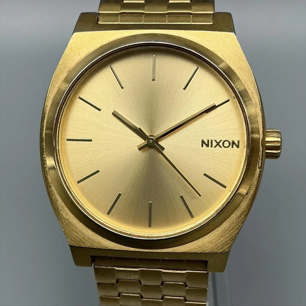 Nixon The Time Teller Minimal Mens Watch 34mm Gold Tone Stretch Band New Battery